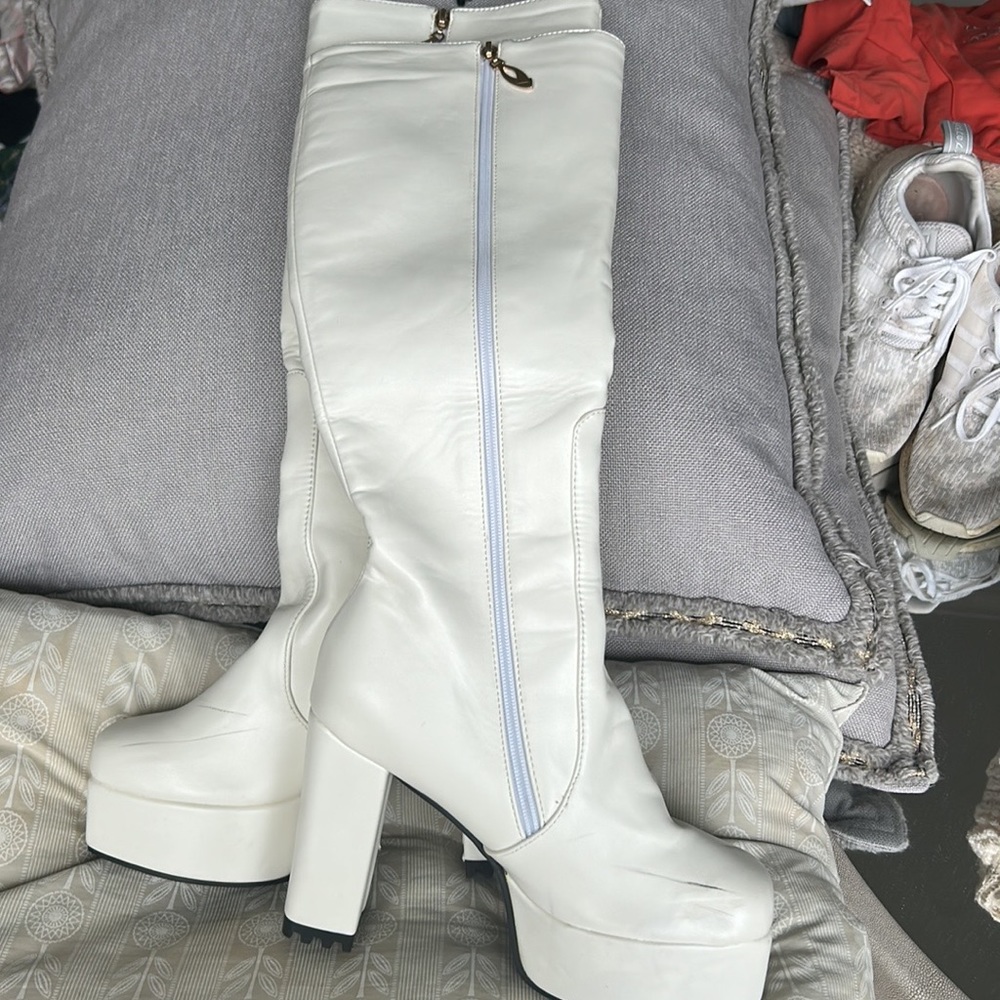 White over the knee boots great for a 60s go go costume or sorority event
